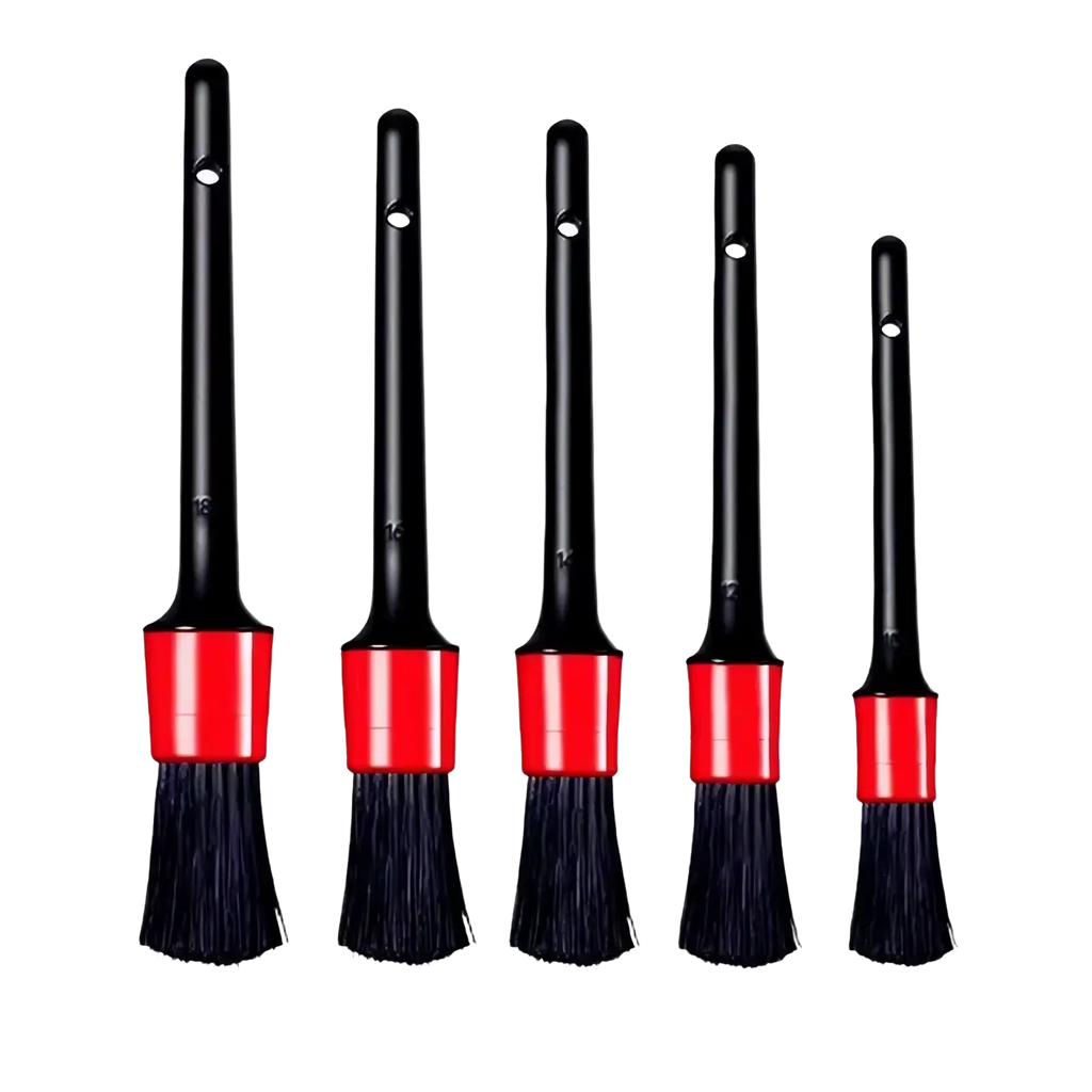 Set of five black and red car detailing brushes with varying bristle widths for auto cleaning kit use