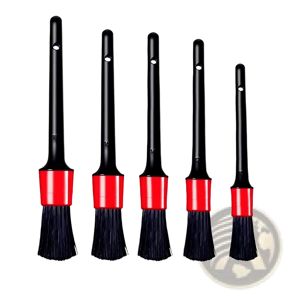 Set of five black and red car detailing brushes with varying bristle widths for auto cleaning kit use