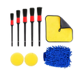 Set of five black and red car cleaning brushes for detailed car care in a car detailing kit and cleaning brush set