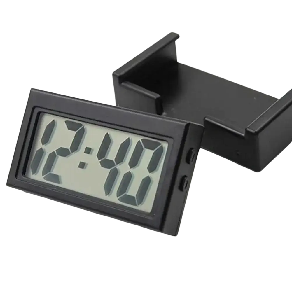Black digital car clock with rectangular dark gray segmented display showing 12 40 for dashboard time display