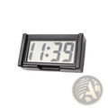 Black rectangular car digital clock dashboard with white electronic time display showing 1 39 in gray digits
