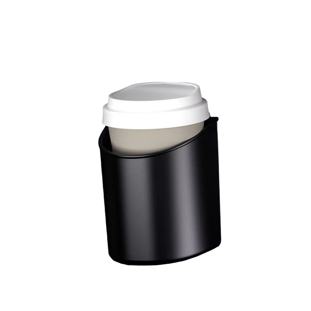 Black matte finish car door cup holder securely grips a white lidded coffee cup for vehicles
