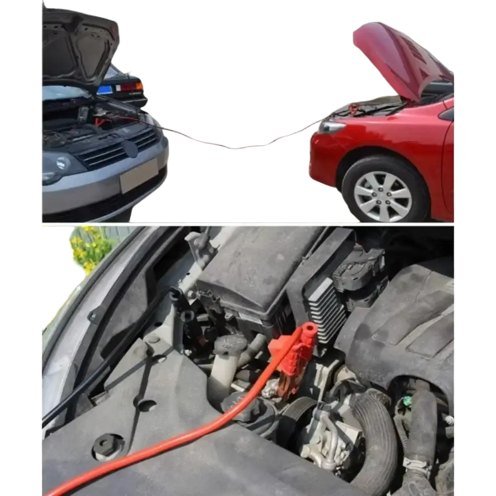 Orange car booster cables 500a battery jumper clamps with red insulated clamps connected to a car engine