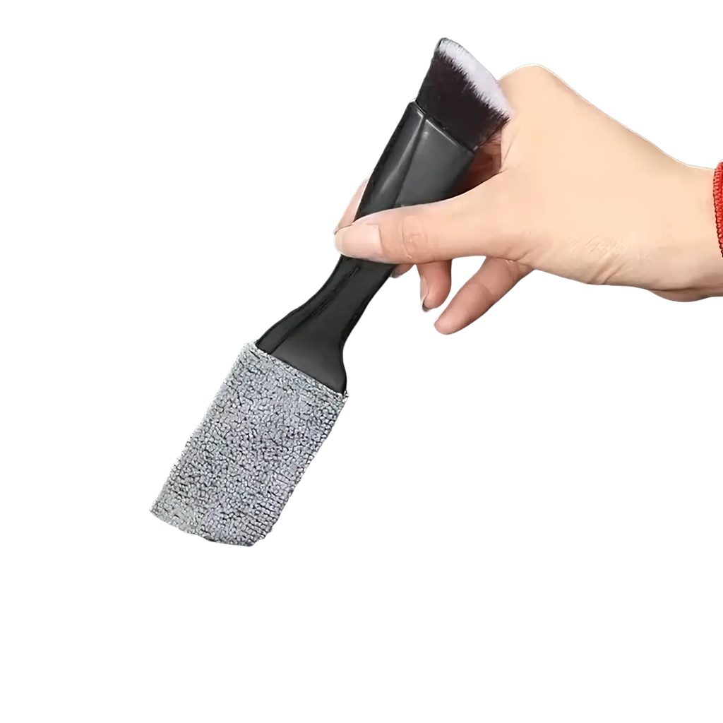Black car interior detailing brush with soft gray microfiber head and dense bristles for effective cleaning