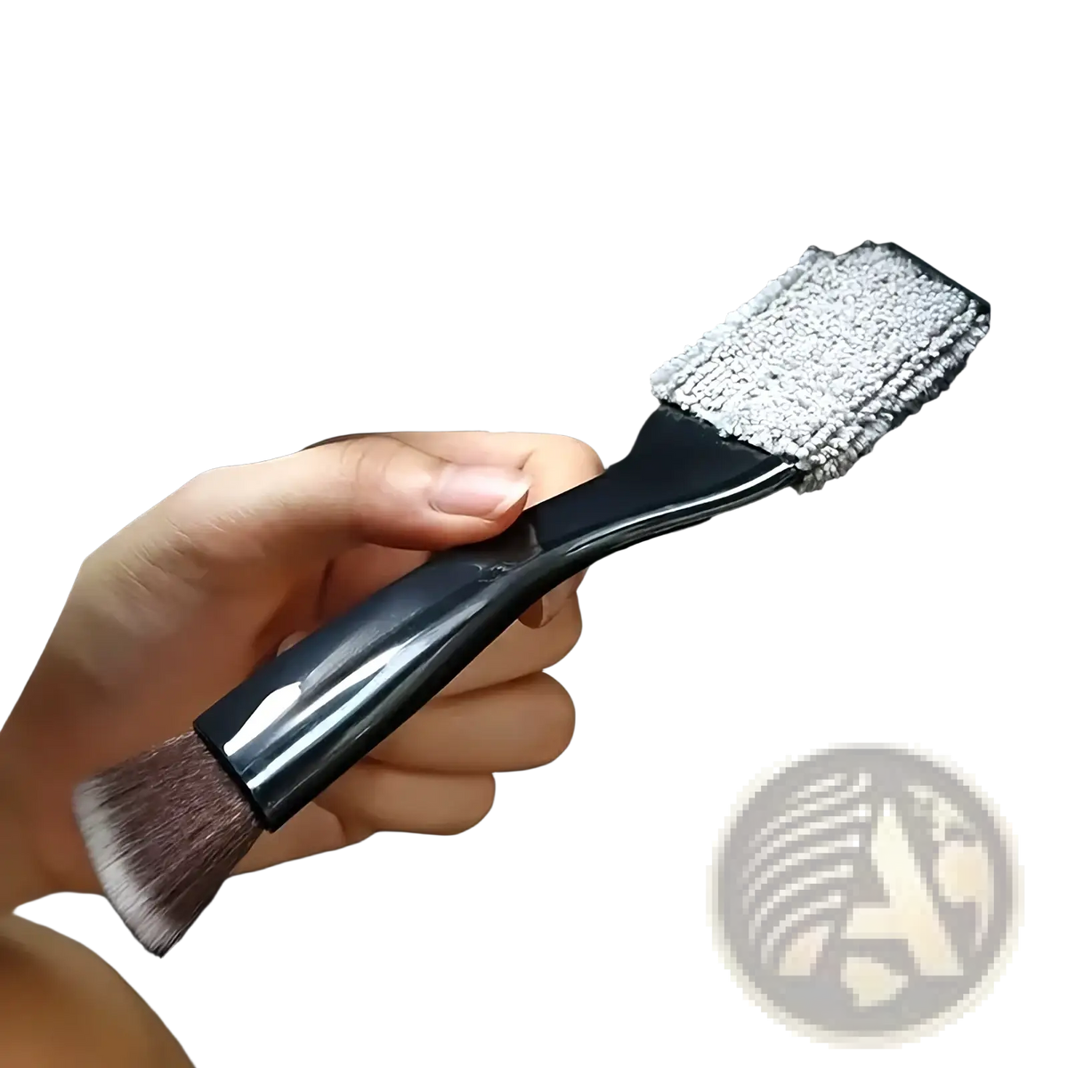 Black-handled car interior detailing brush with dual-sided bristles and gray microfiber cloth attachment for cleaning vents