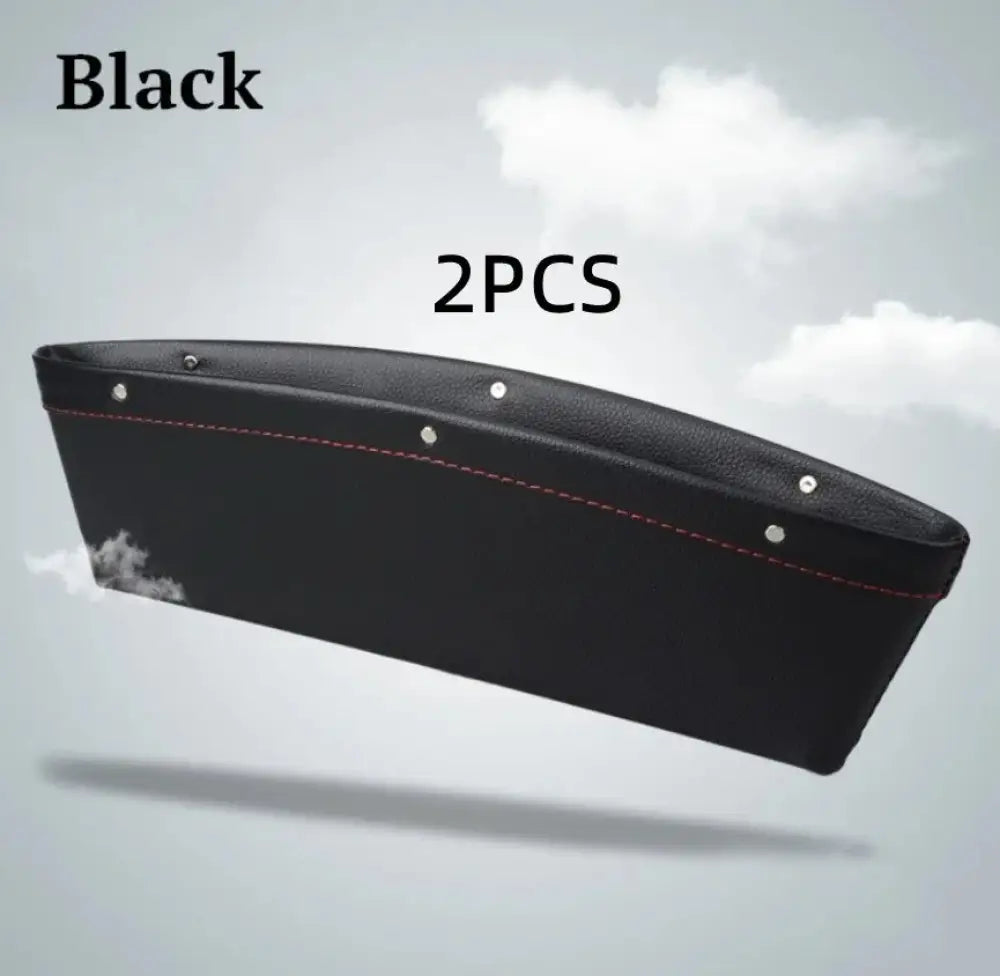 Black leather car seat gap organizer with red stitching and silver rivets made from premium pu leather