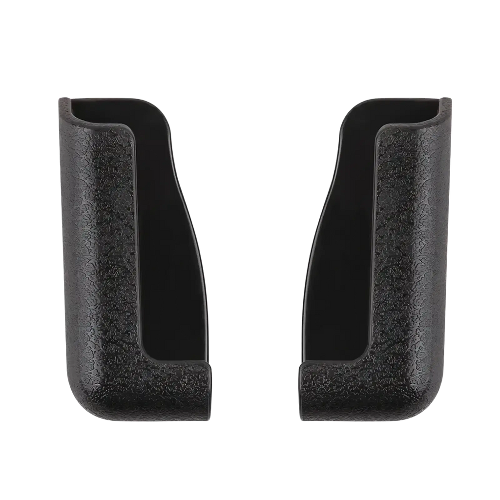 Black textured plastic holster covers on the back side of a car phone holder with usb charger