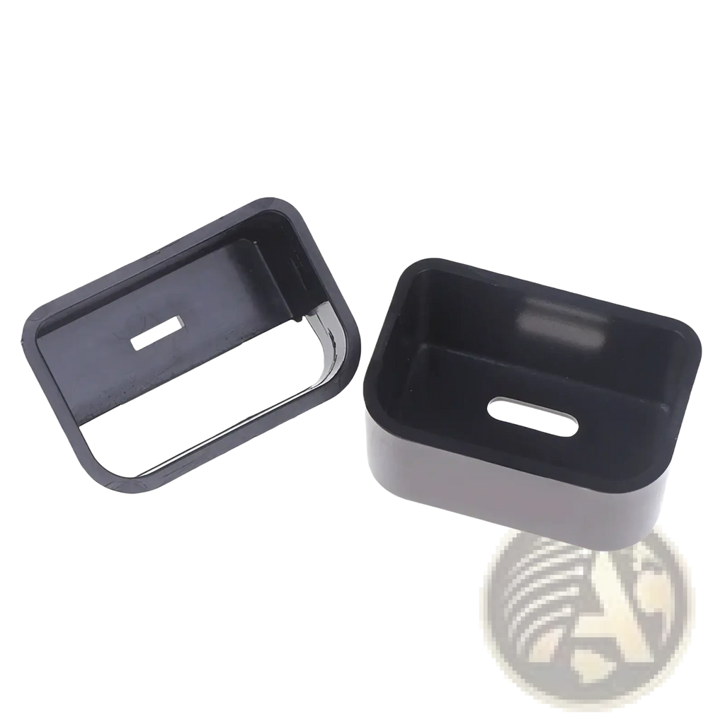Black plastic car seat belt buckle cover with rectangular shape and oval cutout for child safety protection