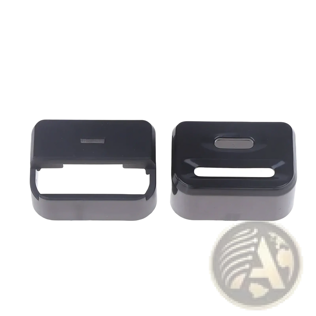 Black plastic car seat belt buckle covers with glossy finish and rectangular cutouts for child safety protection