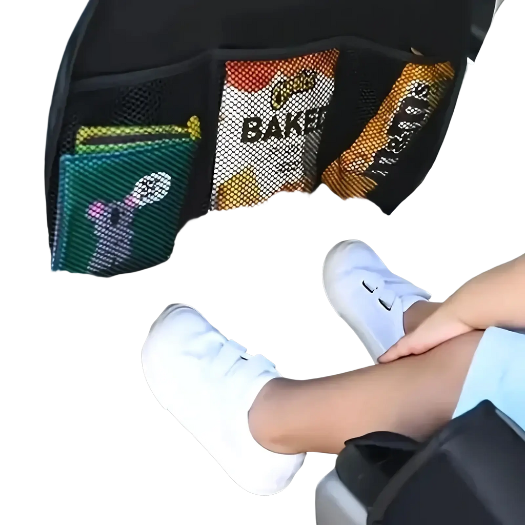 Black mesh waterproof car seat organizer with multiple compartments holding snacks and a small green wallet on backseat