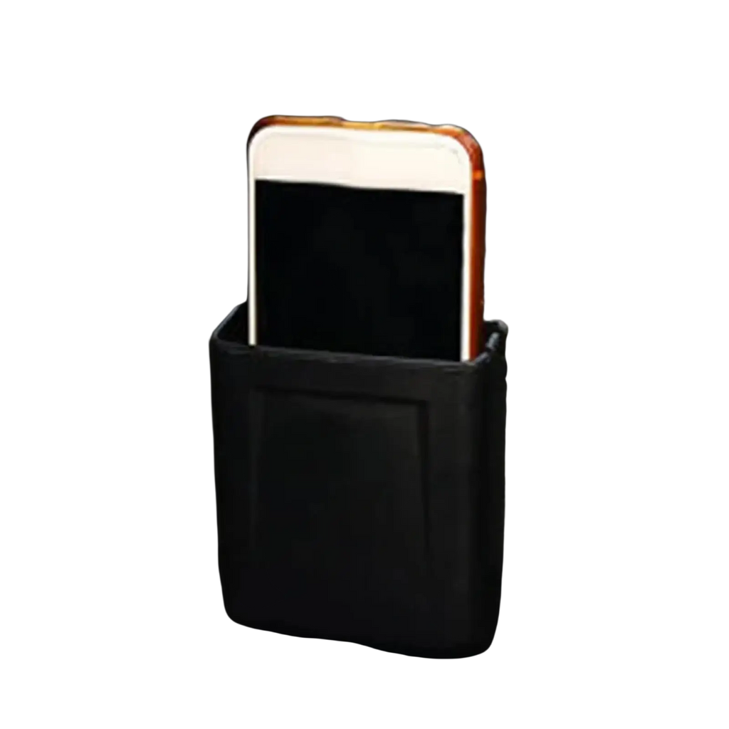 Black leather car storage organizer abs dash pocket mount with a white smartphone in an orange case inside