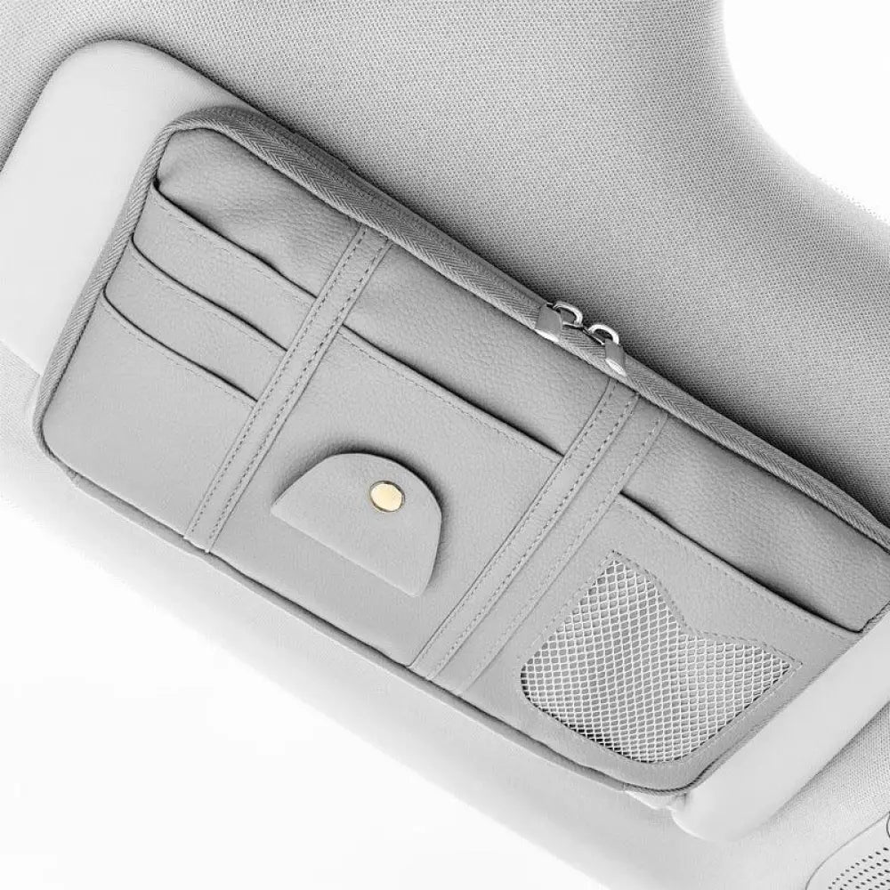 Gray leather premium car sun visor storage organizer with multiple card slots mesh pocket and zipper closure visible