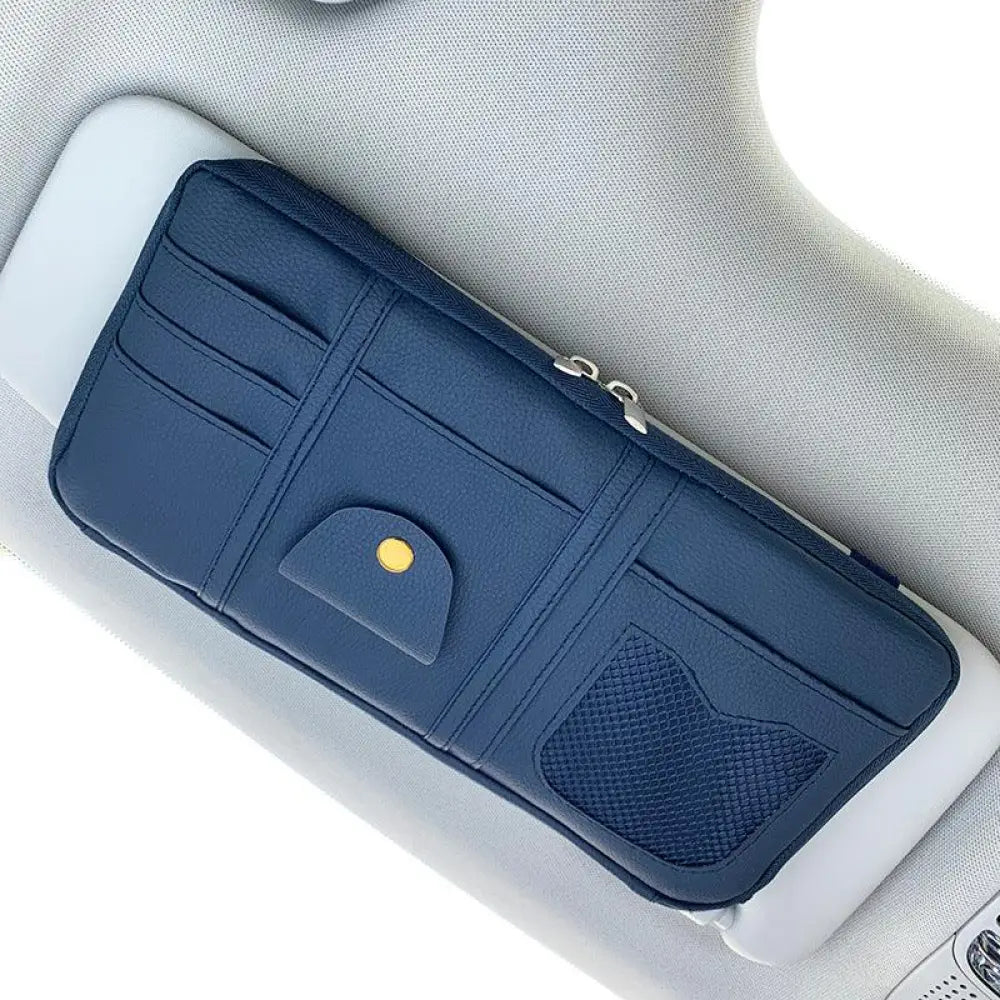 Premium leather car sun visor storage organizer in dark blue with multiple card slots mesh pocket and gold snap button
