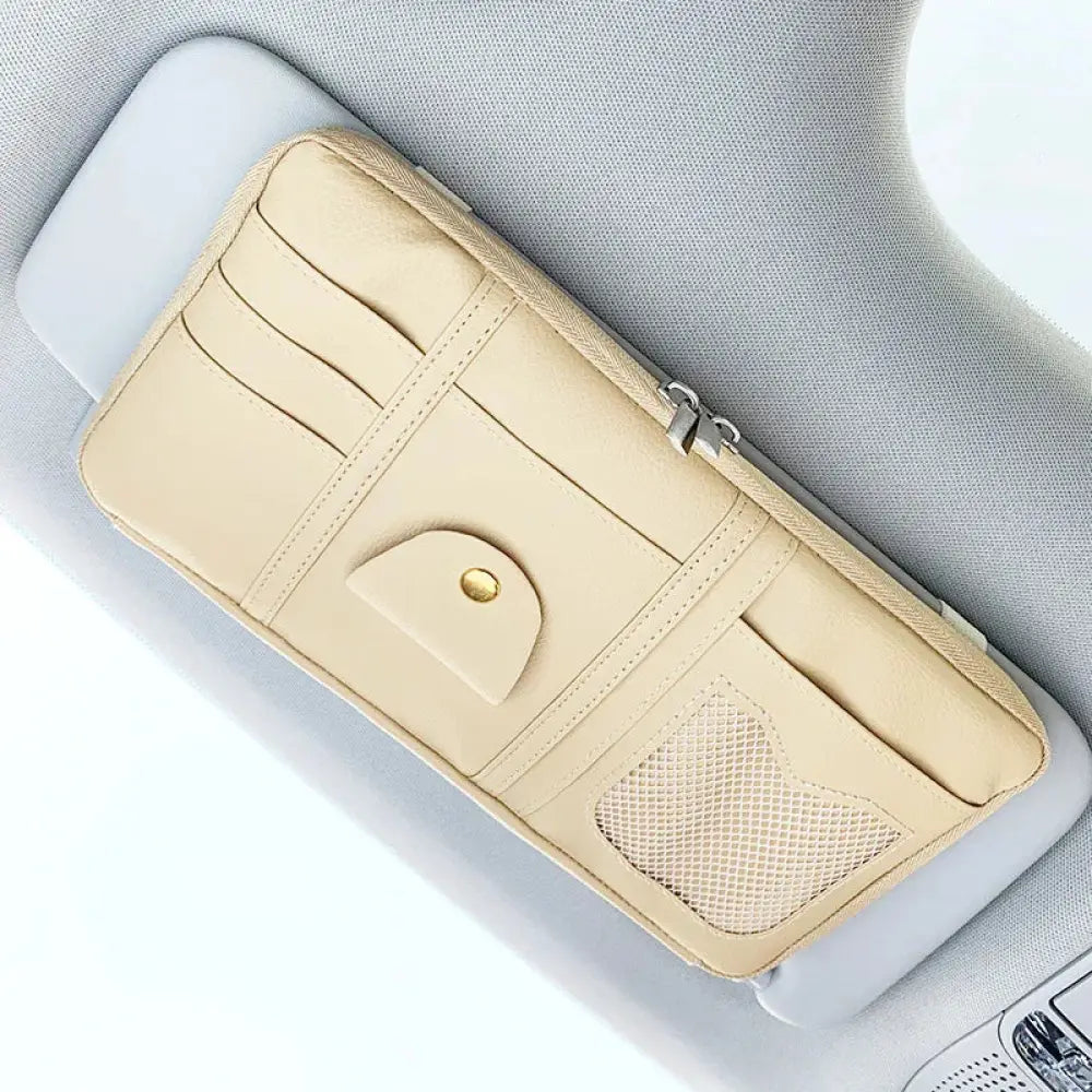 Beige leather car sun visor storage organizer with multiple card slots mesh pocket and zipper closure for convenience