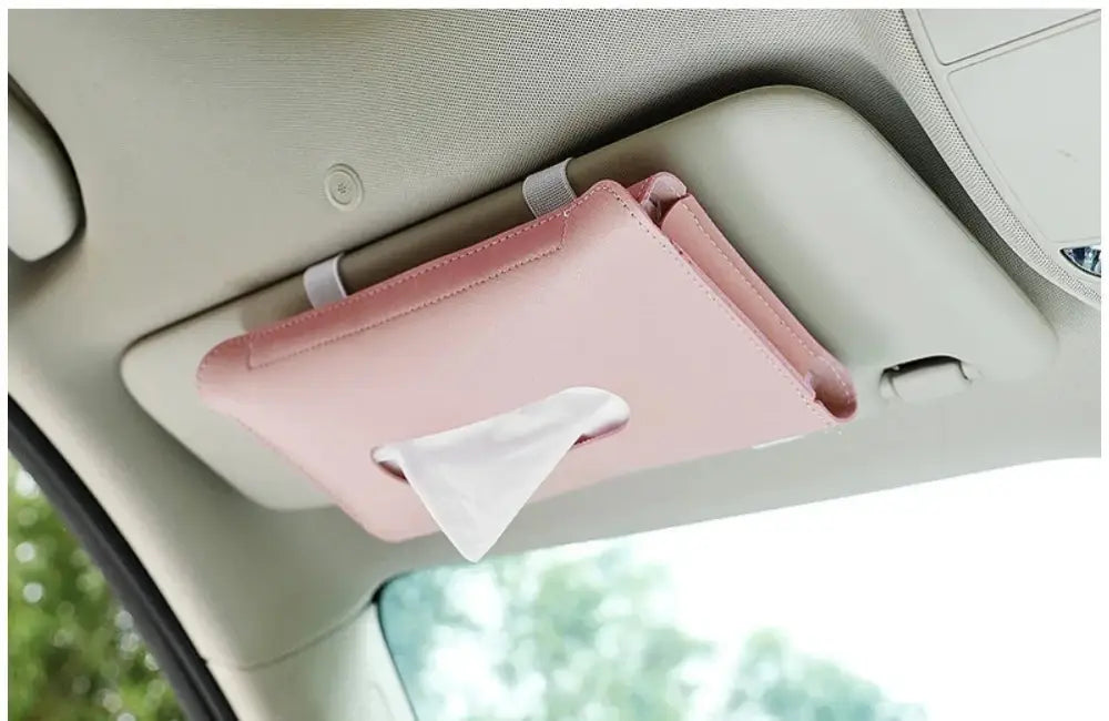 Premium leather pink car sun visor tissue box holder shown mounted on a sun visor for convenient access