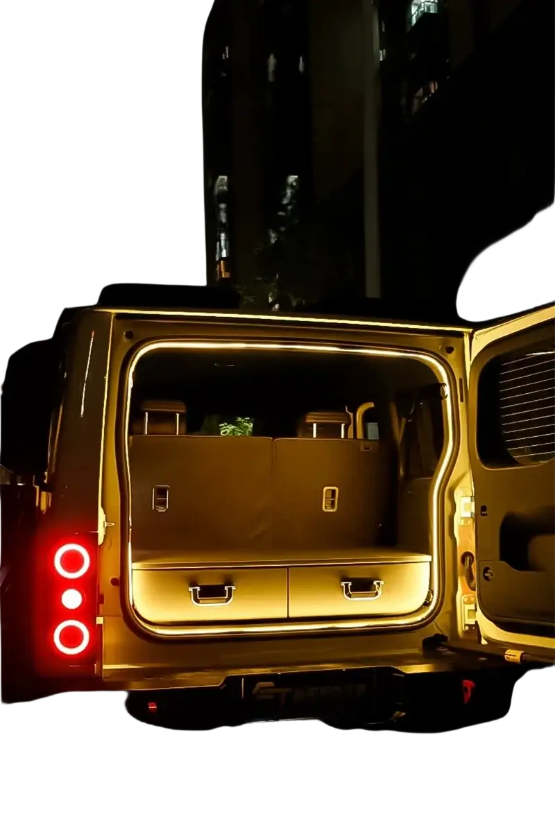 Gold-colored suv rear with illuminated interior and two drawers showcasing car trunk lighting fit for modified auto trunk
