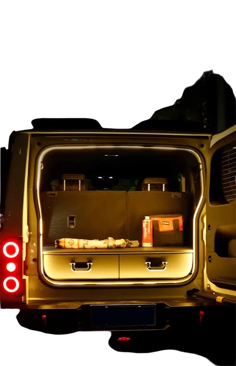 The back of a gold-colored baic 212 t01 2024 suv shows illuminated car trunk lighting with sleek metallic drawers fit for modified auto trunks