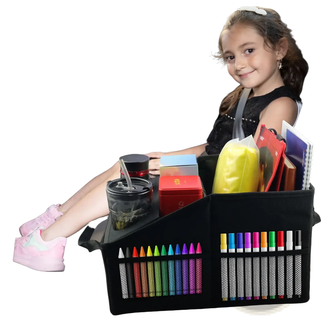 Black fabric car trunk organizer foldable storage bag with mesh pockets holding crayons and markers for kids view of back seat