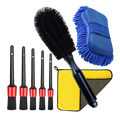 Black and red car washing kit with soft bristle detailing brushes for precise interior and exterior cleaning