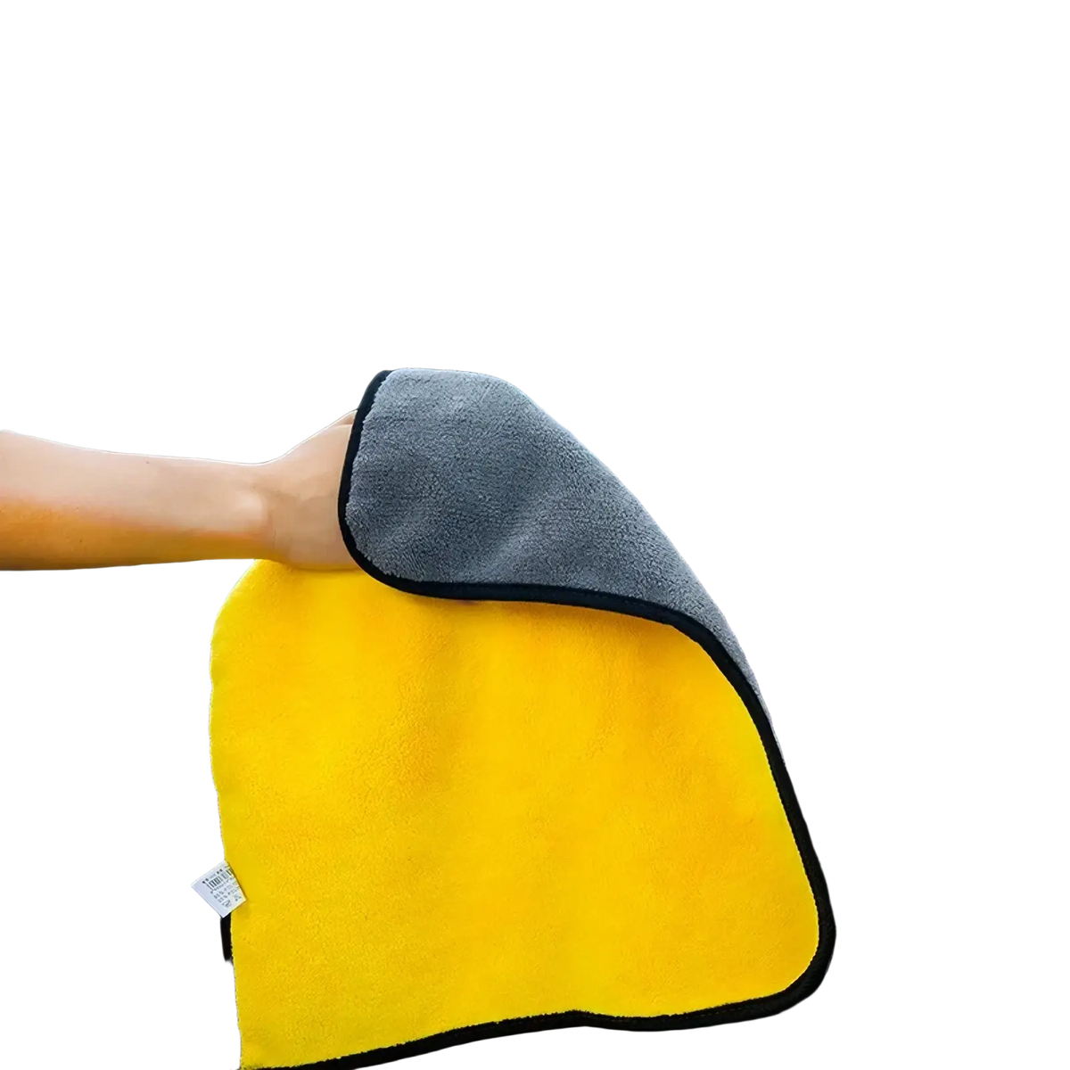 Bright yellow microfiber car cleaning cloth with gray side and black trim from car washing kit and detailing brush set