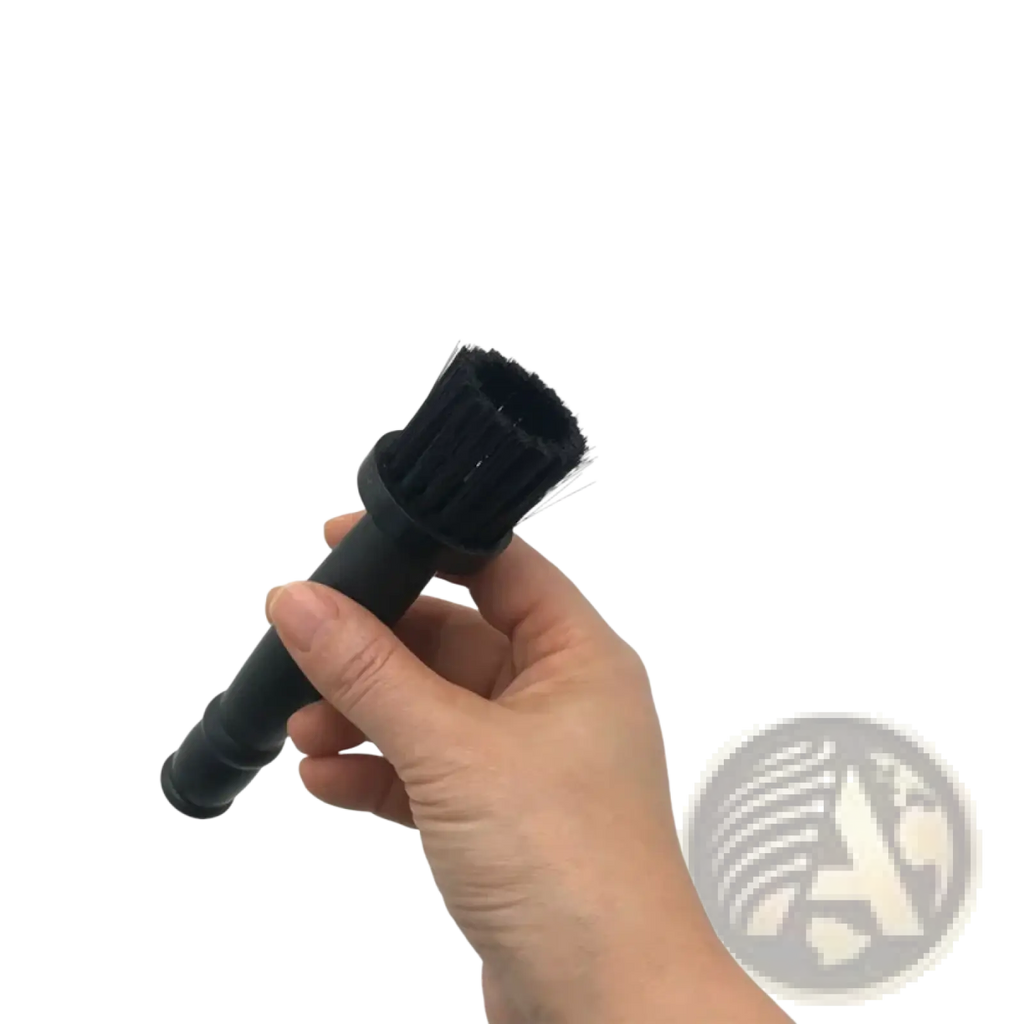 Black bristle brush with sturdy plastic handle for car wheel detailing and rim cleaning in a cleaning brush set