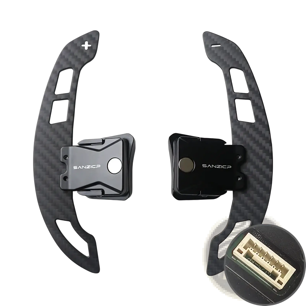 Black carbon fiber Audi R8 magnetic shift paddles with USB port integrated at the base for performance steering control
