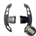 Black carbon fiber Audi R8 magnetic shift paddles with USB port integrated at the base for performance steering control