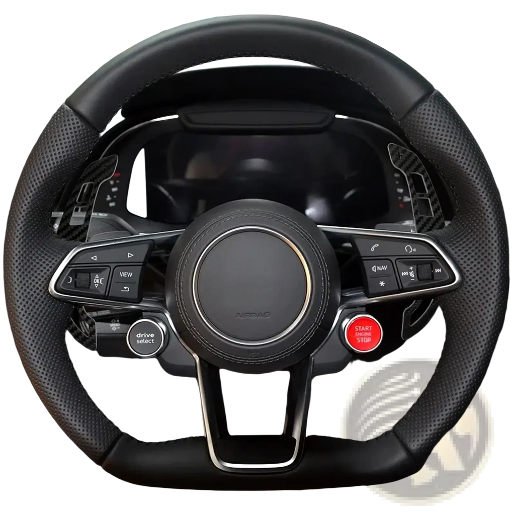 Black perforated leather Audi R8 steering wheel with carbon fiber accents and silver trim featuring airbag emblem