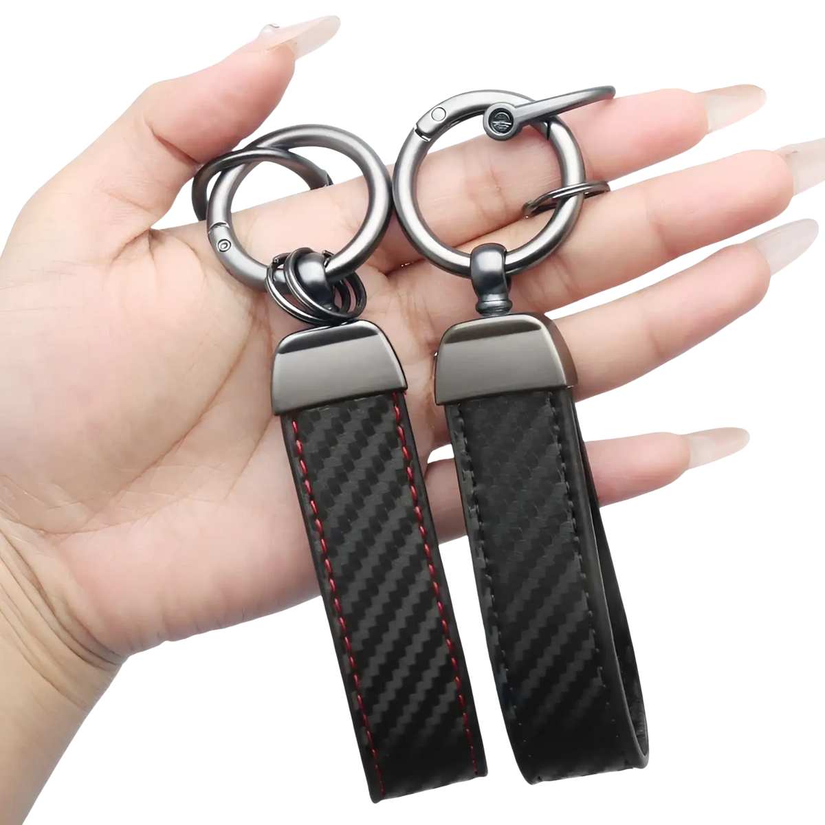 Carbon fiber car keychains with red stitching and metallic silver hardware for stylish key organization