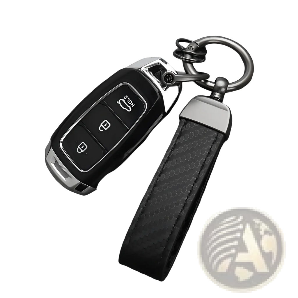 Carbon fiber car keychain with red stitching featuring a black carbon fiber key fob silver accents and leather strap