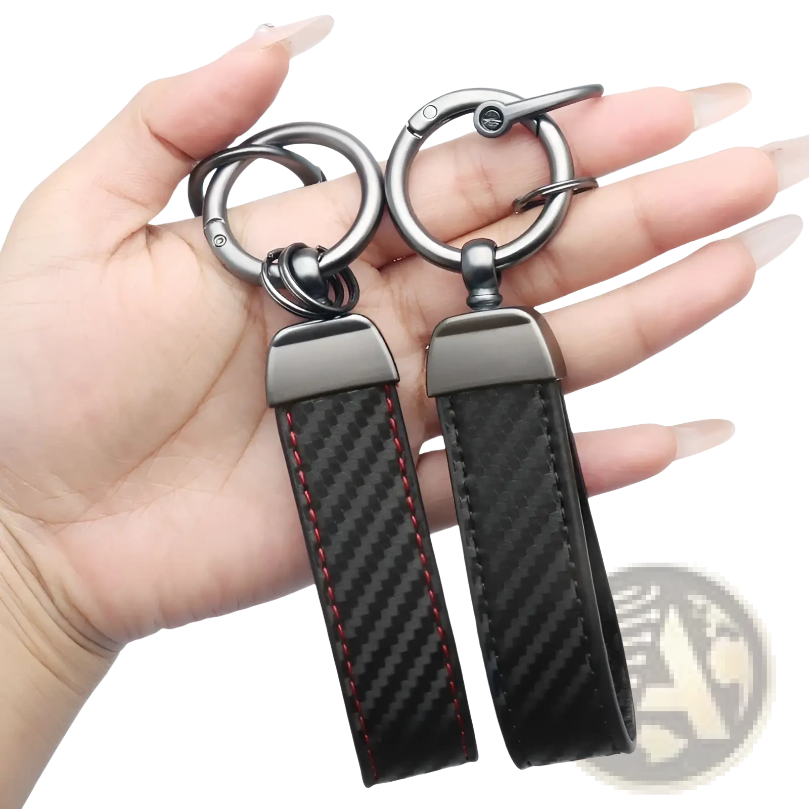 Carbon fiber car keychains with red stitching and metallic silver hardware for stylish key organization