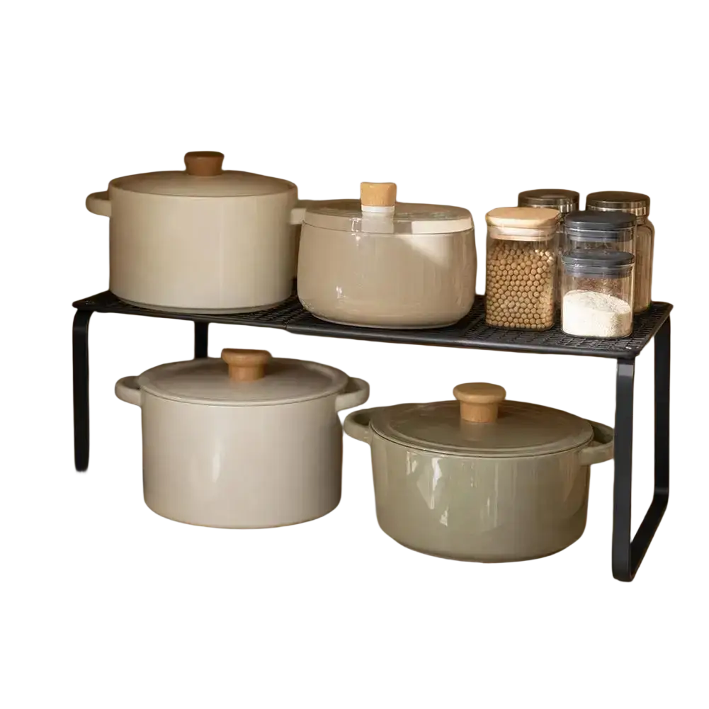Black metal pot rack with beige and gray ceramic pots on a carbon steel adjustable stackable closet shelf organizer