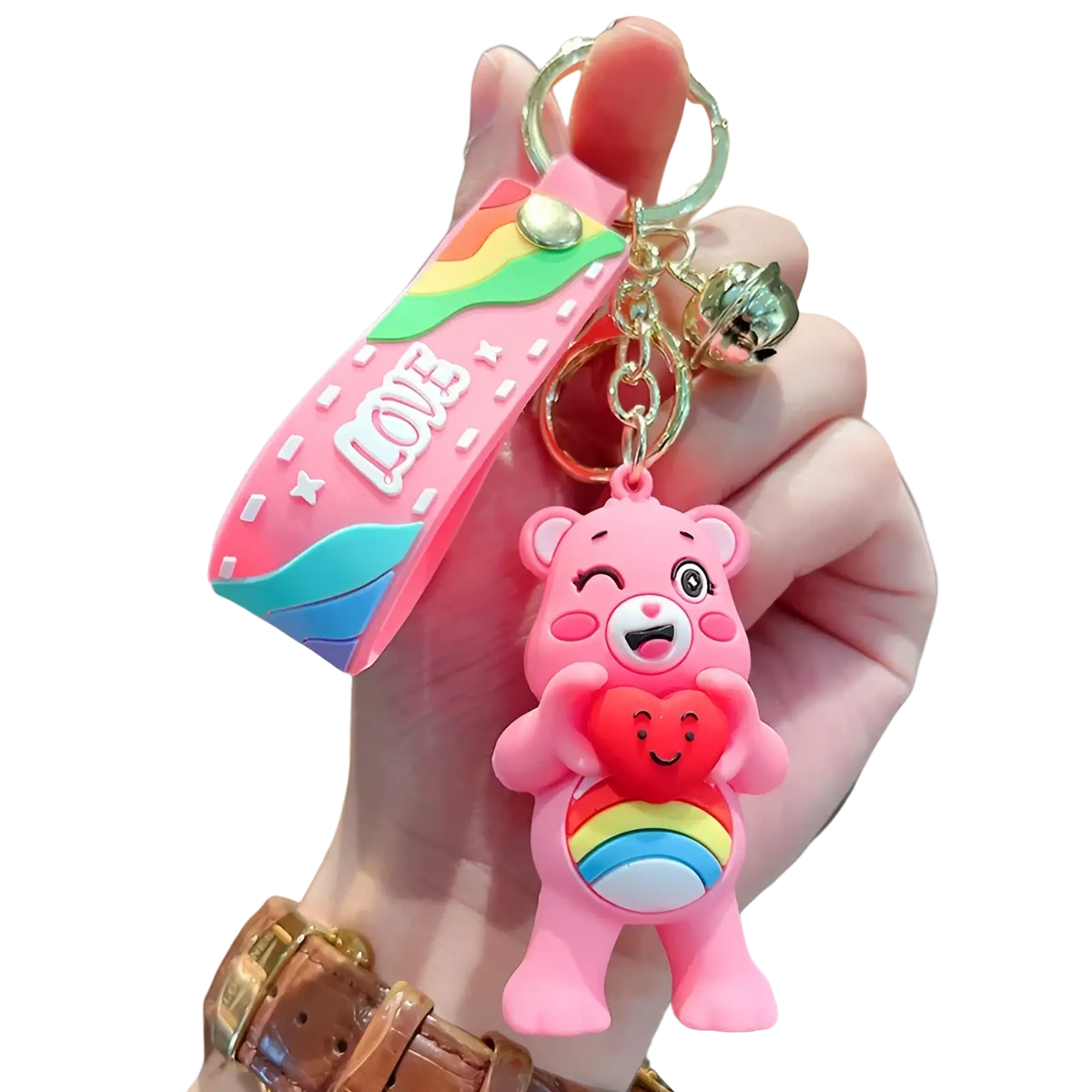 Pink silicone care bears cartoon keychain with rainbow heart belly attached to a pink strap reading love