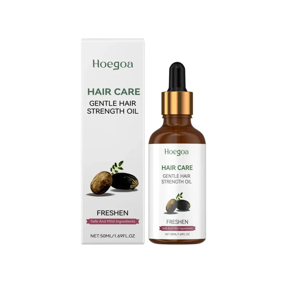 Hoegoa gentle hair strength and nourishing shine oil in a brown glass bottle with gold dropper and white label beside packaging