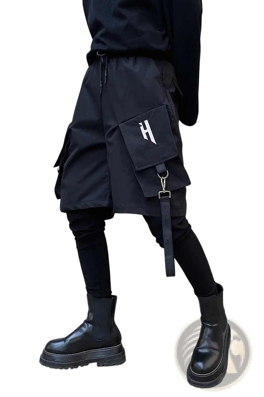 Black cargo shorts with detachable strap and white h logo on front pocket designed for hip hop style and utility