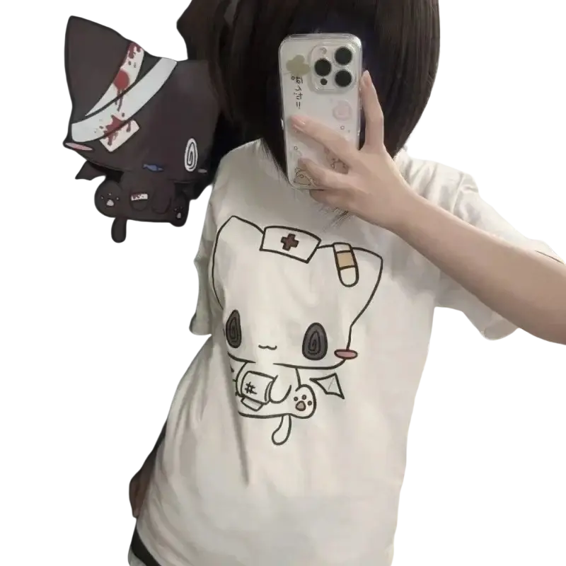 White cotton t-shirt featuring a cartoon nurse print with black and pink accents in y2k harajuku style