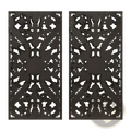 Black metal decorative panels featuring intricate symmetrical cut-out patterns for carved wood wall decor set