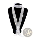 A sparkling white crystal multi strand choker necklace with a cascading design showcasing elegance and style