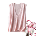 A soft pink cashmere wool v-neck sweater vest with a deep neckline and ribbed hem for elegant layering