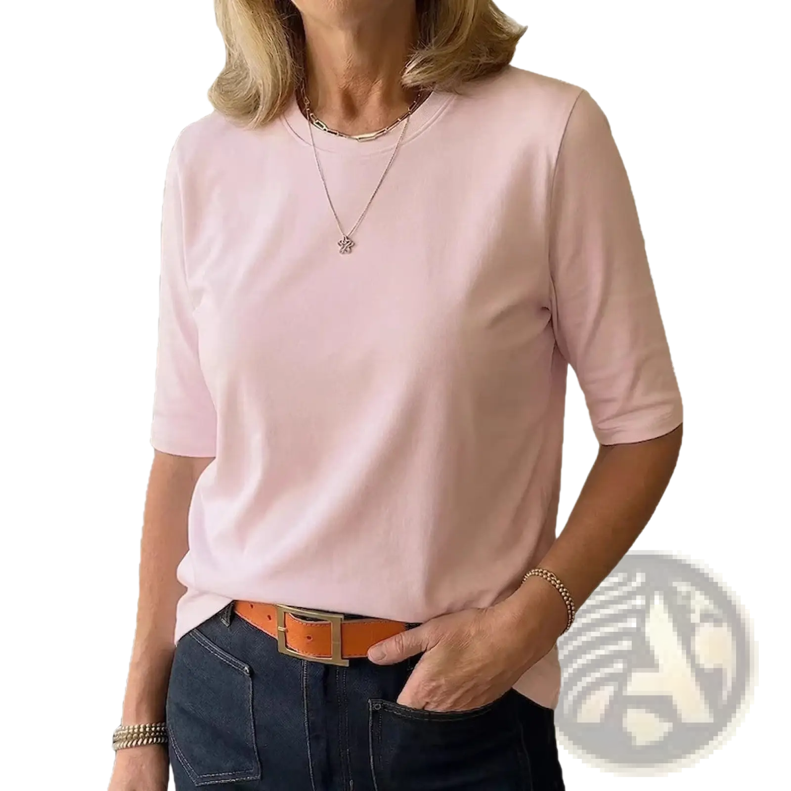 A soft pink casual crew neck pullover top with short sleeves and a relaxed fit made for everyday wear