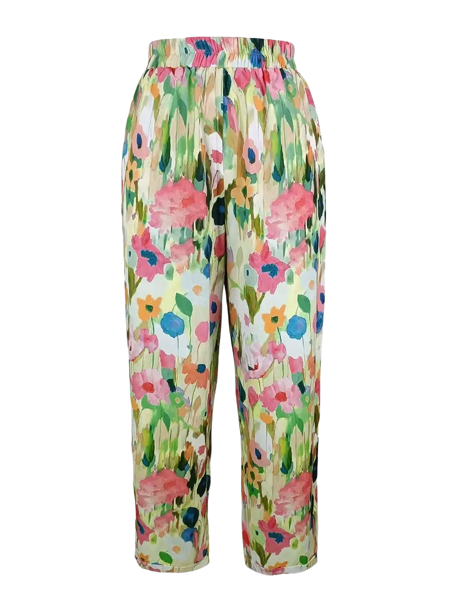 Casual floral print wide leg pants in soft watercolor design with pink blue and green blossoms on cream background