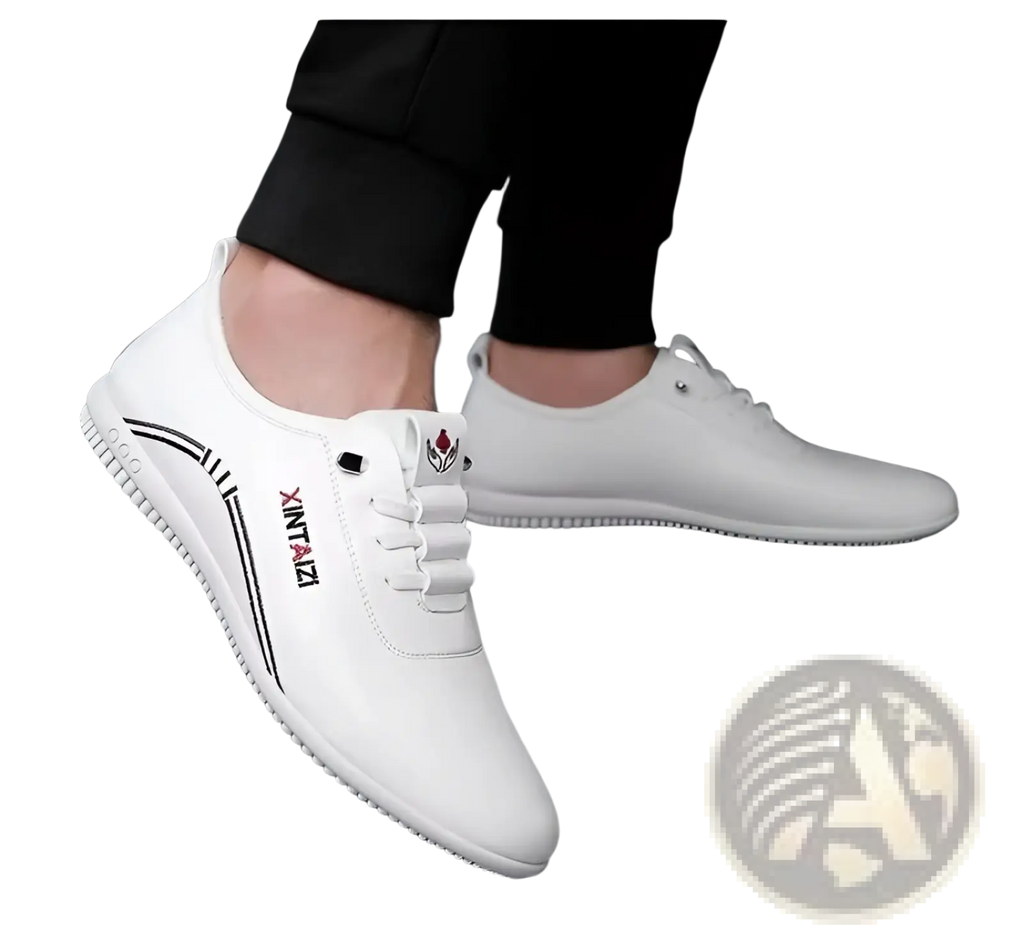 White leather casual flat sneakers with black branding and stitching details lightweight breathable design