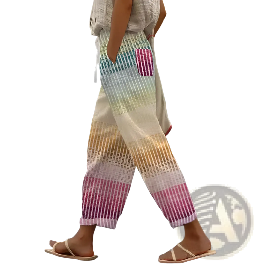 Casual patterned drawstring pocket pants featuring rainbow-striped woven fabric with a magenta and white patch pocket