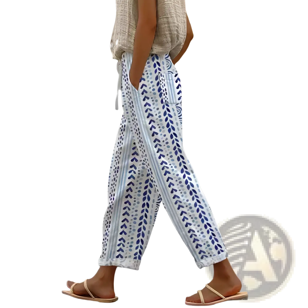 White cotton casual patterned drawstring pocket trousers with blue leaf and dot pattern and gray side stripes