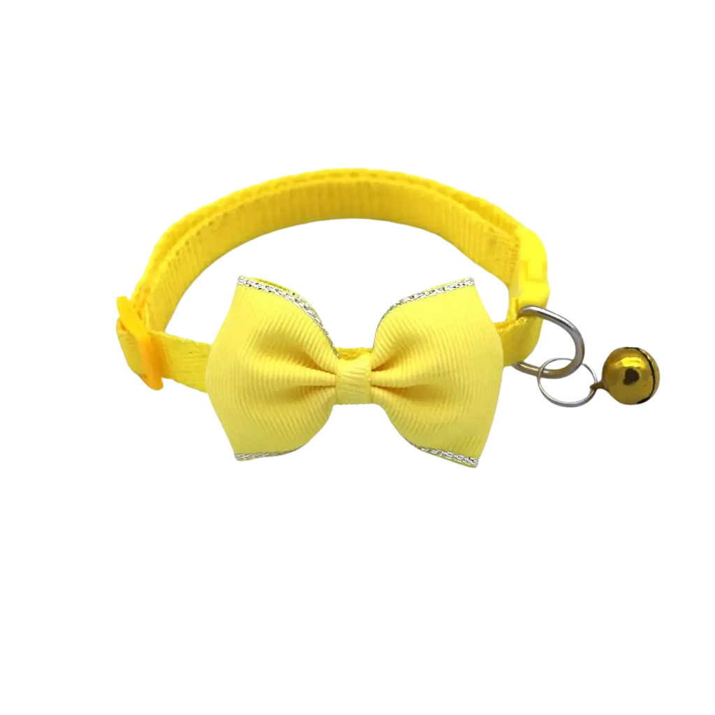 Bright yellow adjustable cat collar with matching bowtie featuring silver glitter trim and a small gold bell