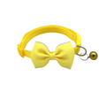 Bright yellow adjustable cat collar with matching bowtie featuring silver glitter trim and a small gold bell
