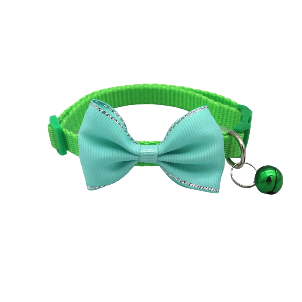 A mint green bow tie cat collar with shiny silver trim and matching metallic bell adjustable multicolor set