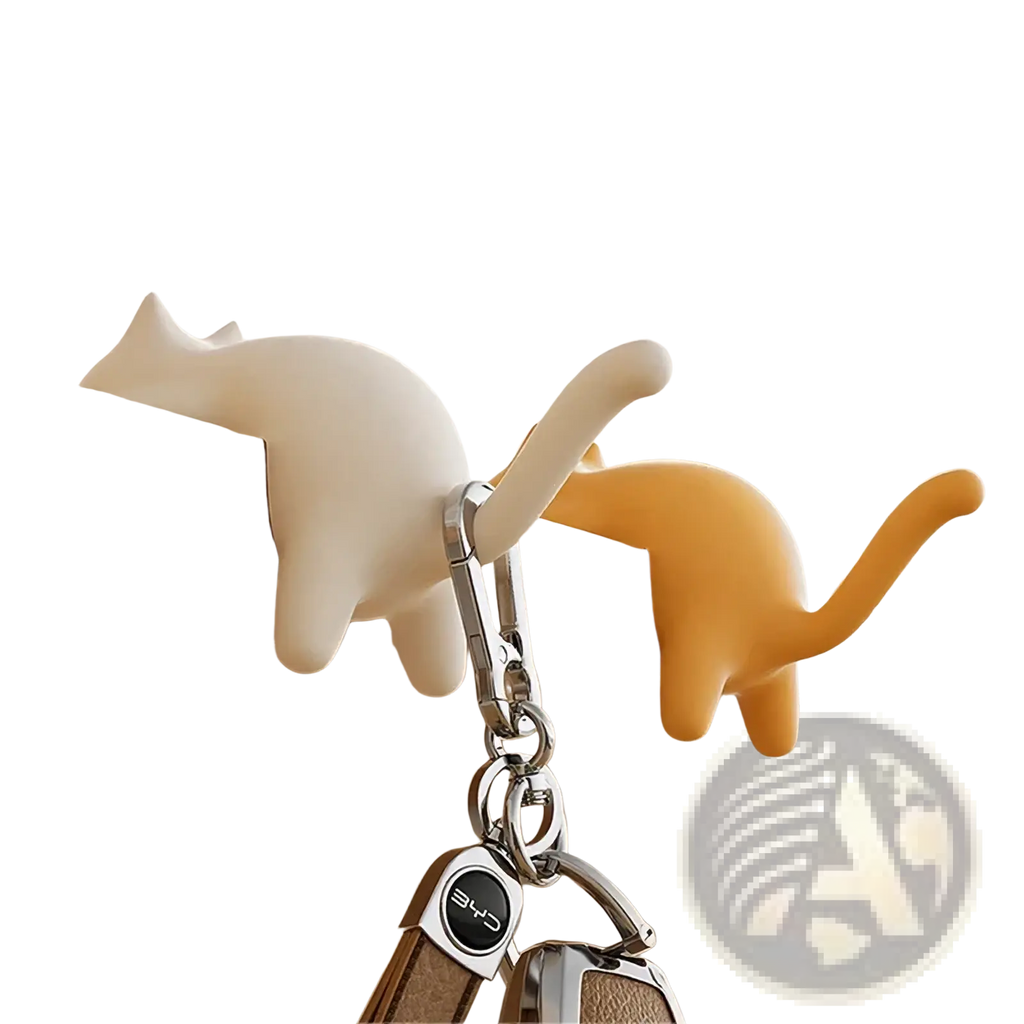 Cream and orange silicone cat-shaped desk hooks with metal clasps for organizing and hanging items