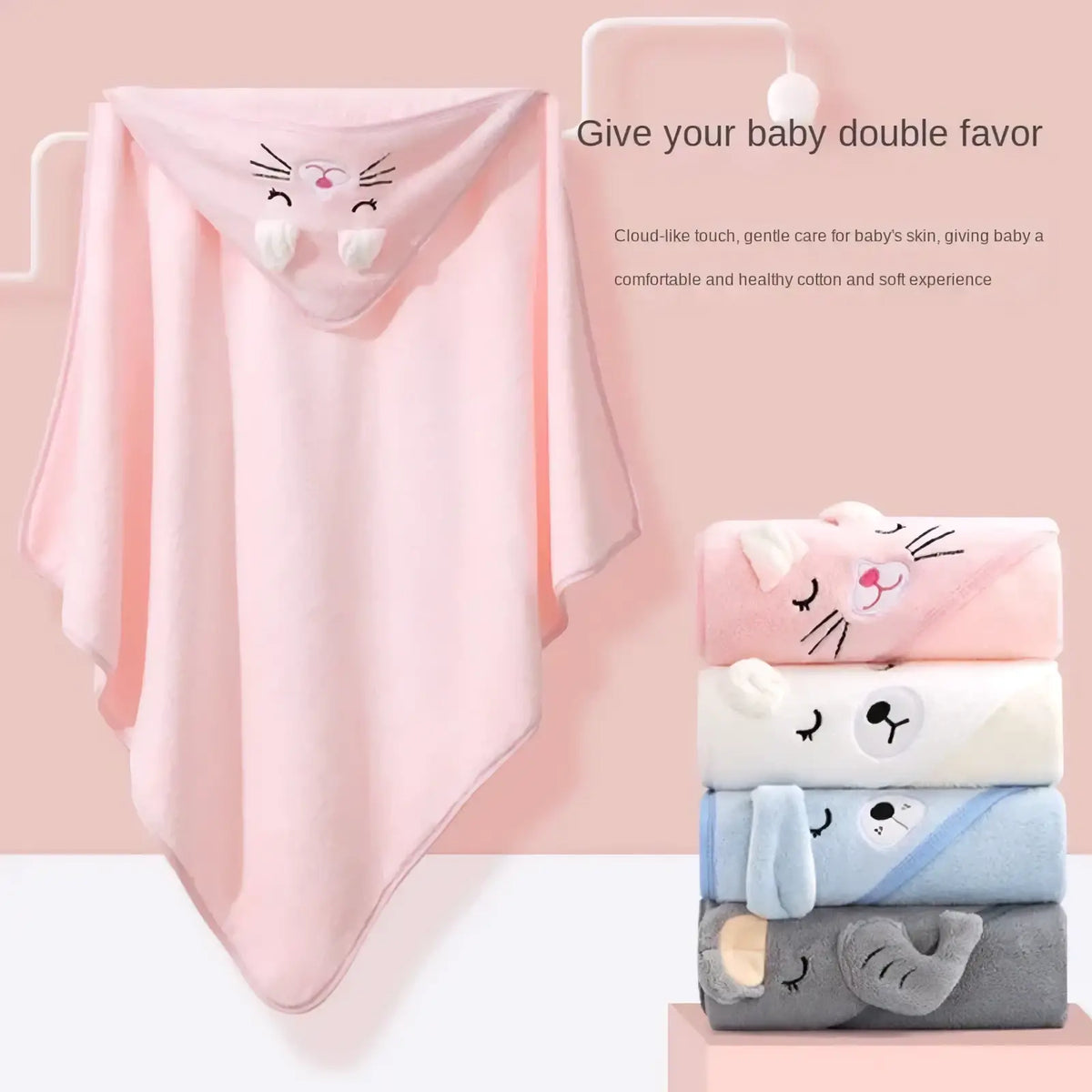 Pink hooded baby towel soft plush absorbent with embroidered cat face closed eyes whiskers and white paw-like ears