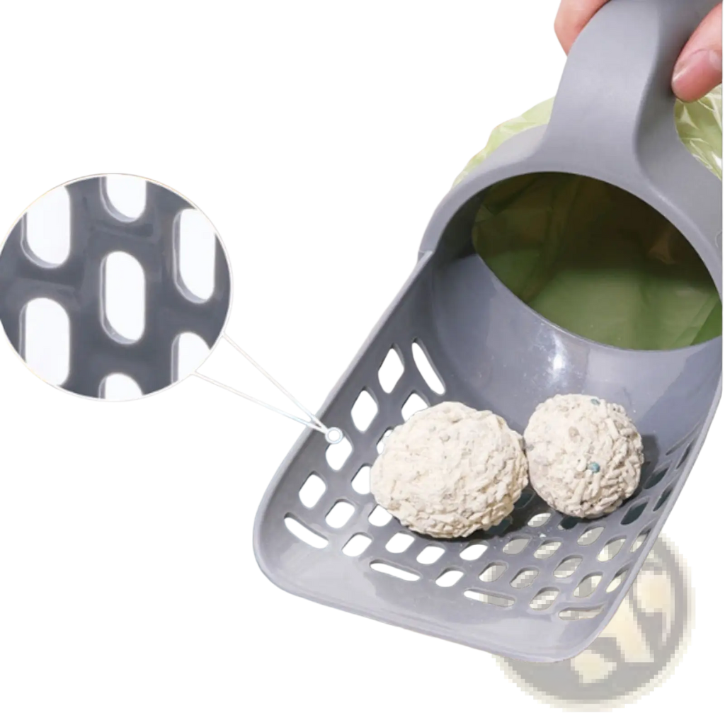Gray plastic cat litter scoop with green interior and oval perforations featuring an integrated bag dispenser